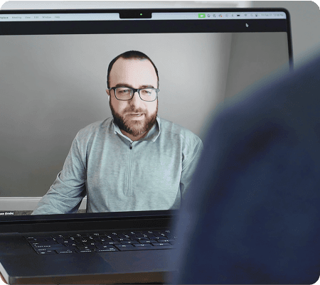 Team member on a video conference call, demonstrating remote work